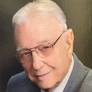 Tom Cole looking at camera